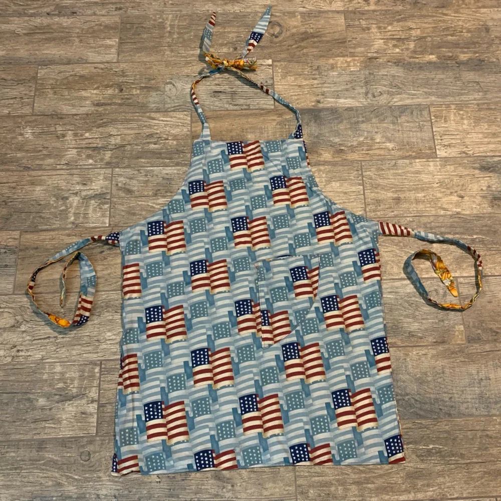Adult homemade double sided apron with American flag print and scarecrow print