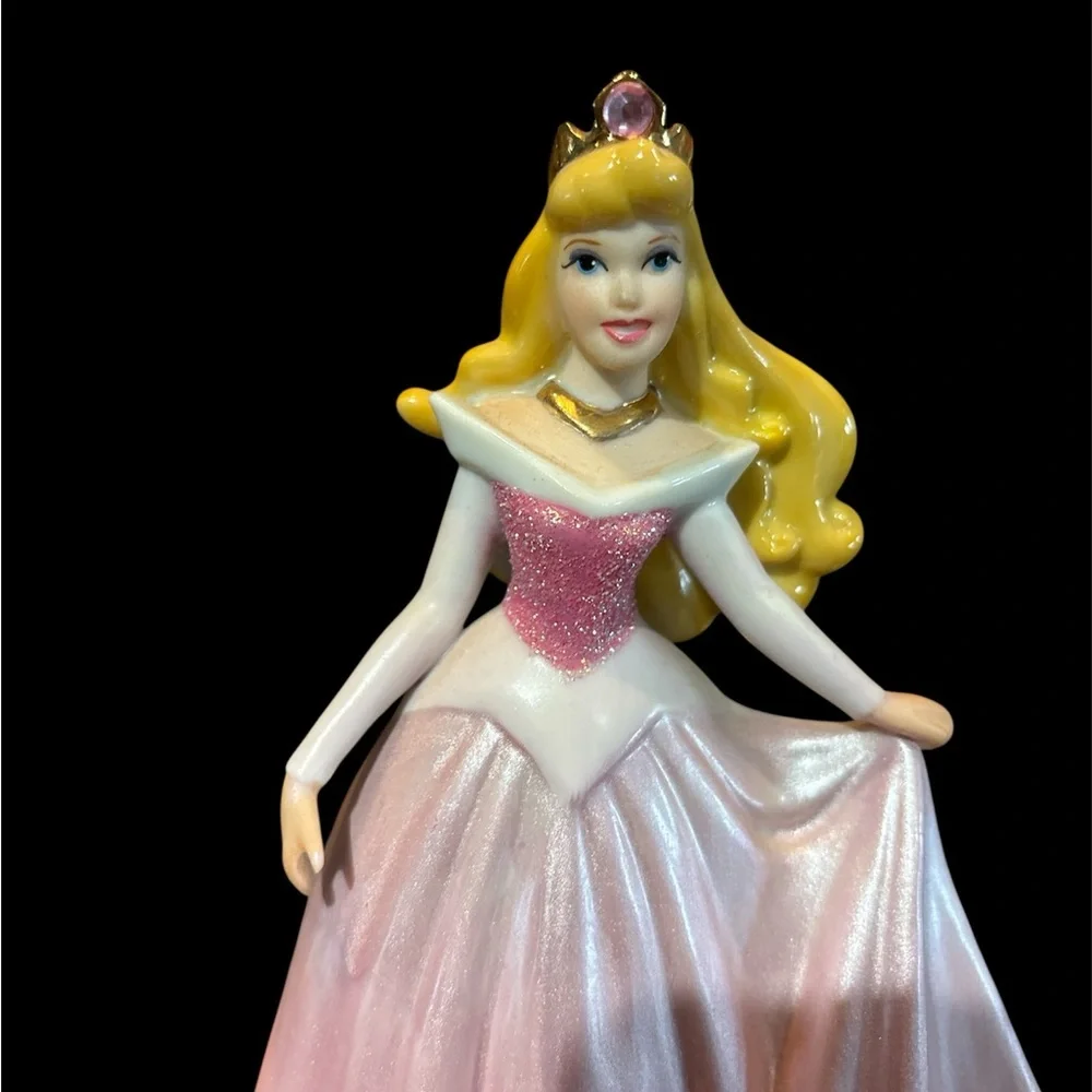 Disney Princess Aurora Figurine with Pink Dress and sparkly crown.