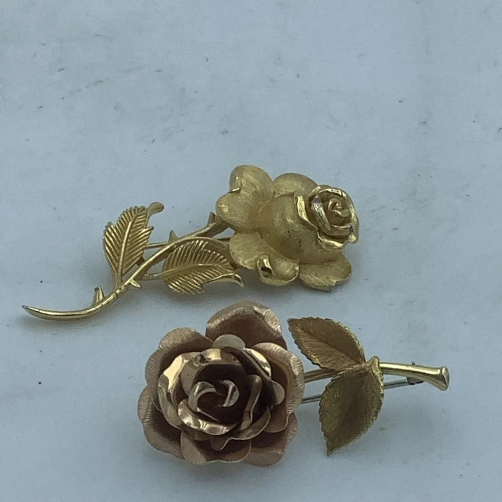 Two Goldtone Rose Brooches
