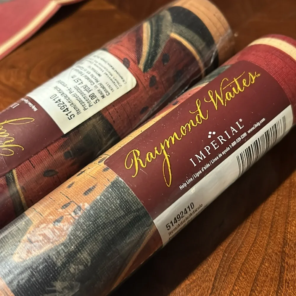 Raymond Waites yards adding wallpaper