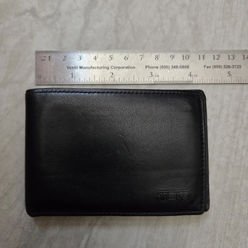 Like New TUMI Slim Bifold Soft Black Leather Wallet