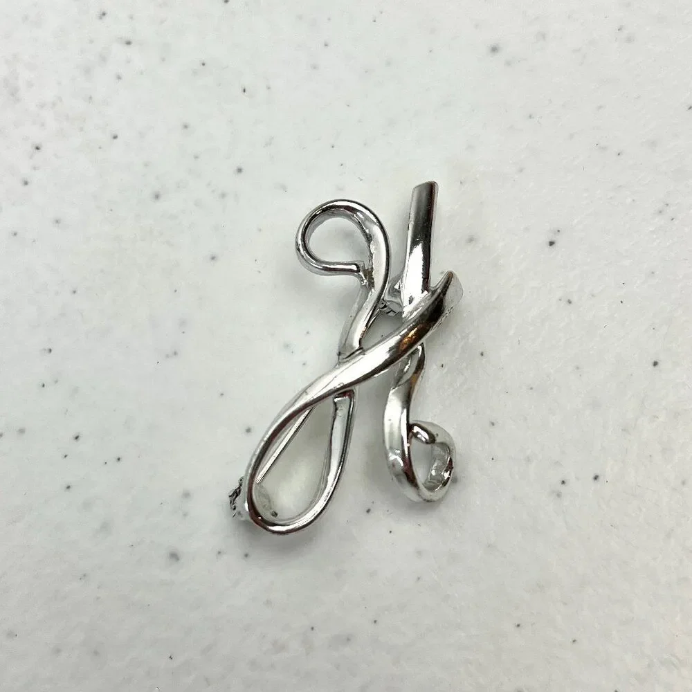initial metal it