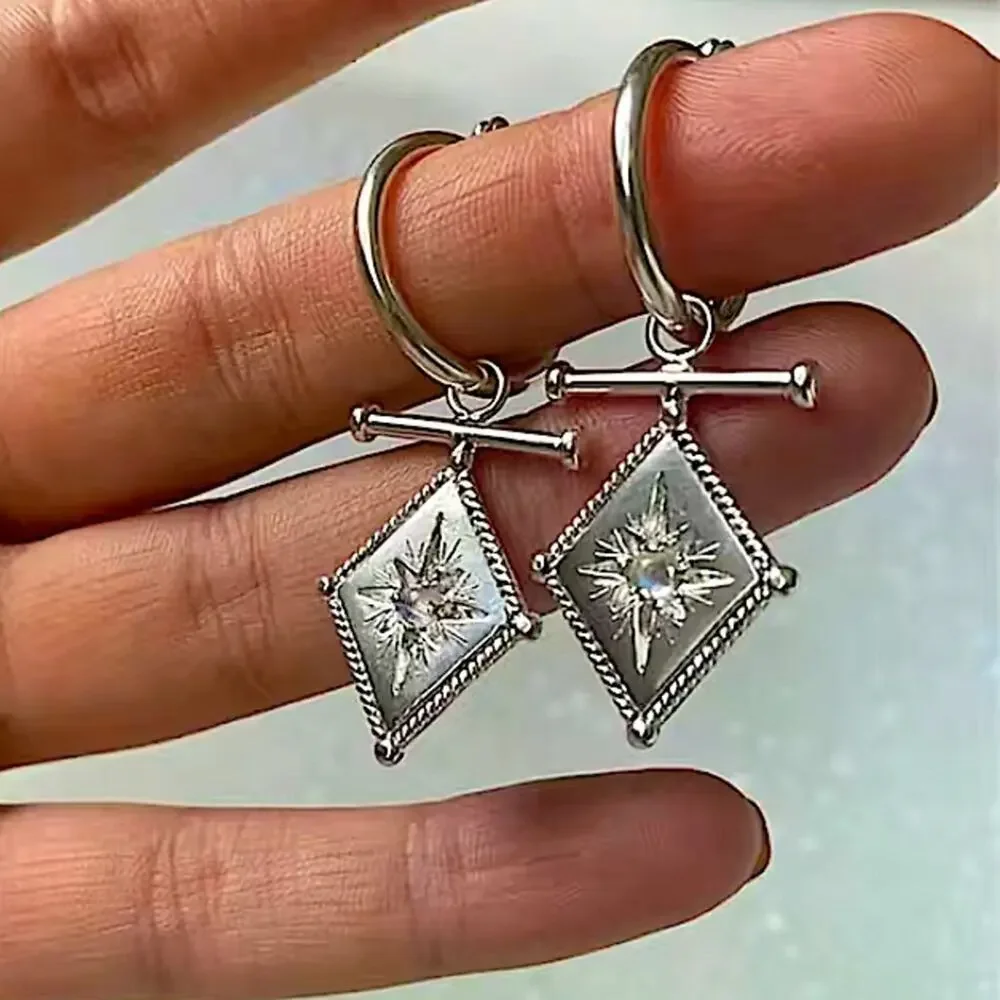Silver North Star Starburst Zircon Dangle Drop Earrings