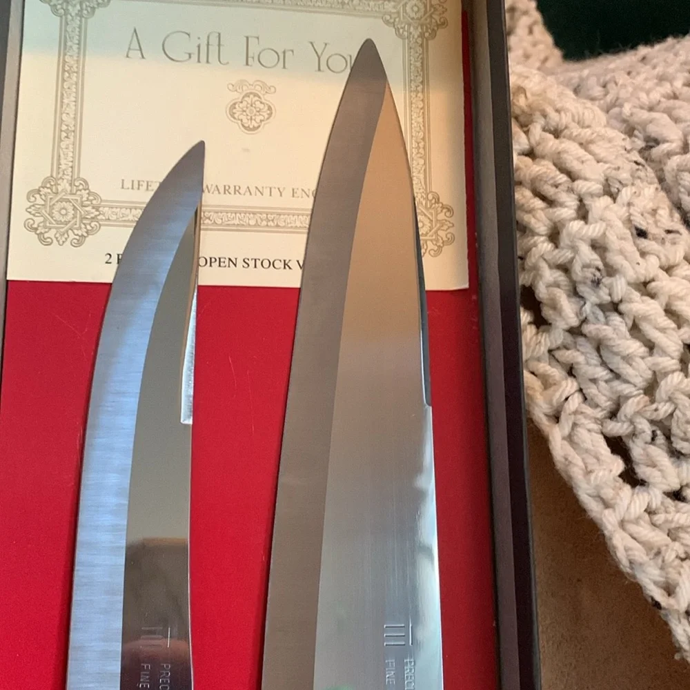 Set of Maxam carving knives in original box, blades approximately 6” & 8”