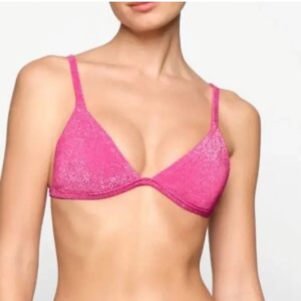 SKIMS glittery pink