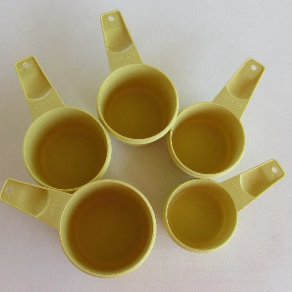 Vintage 1970s Tupperware Yellow Nesting Measuring Cup Set of 5 Made In U.S.A