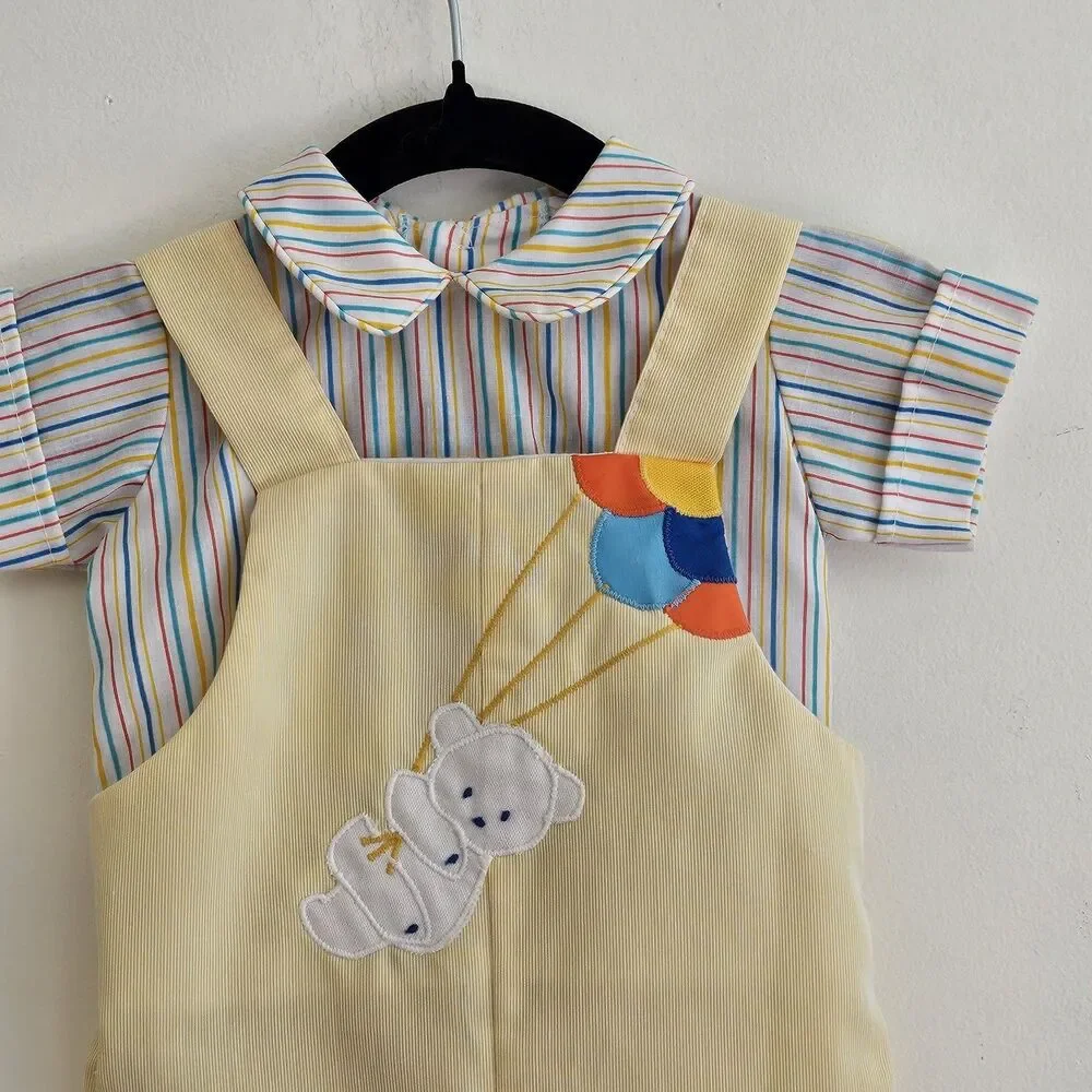 Yellow and multi-colored baby unisex 2-piece outfit, size 3-6m. EUC. Made in USA