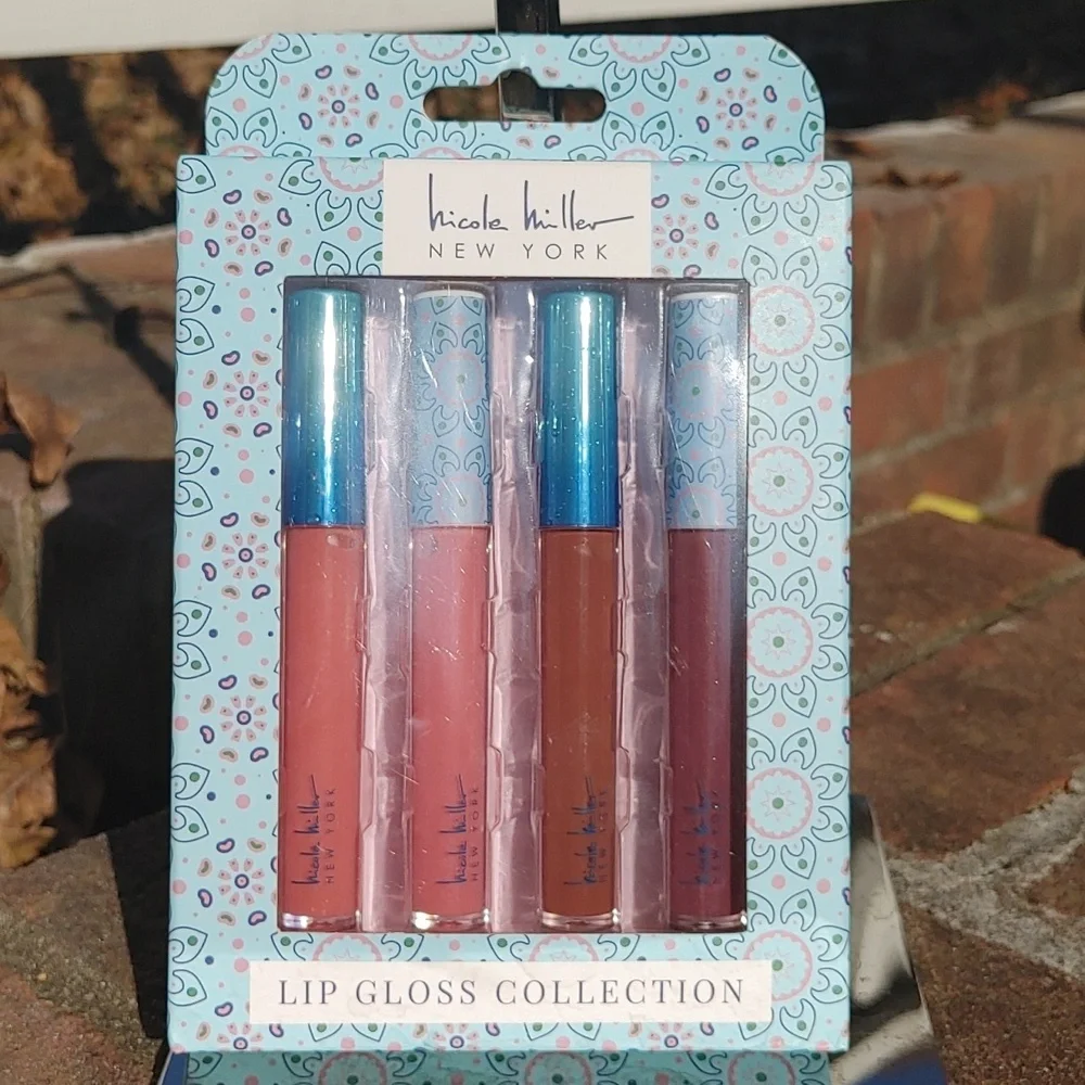 Nicole Miller 4 Piece Lip Gloss Set
