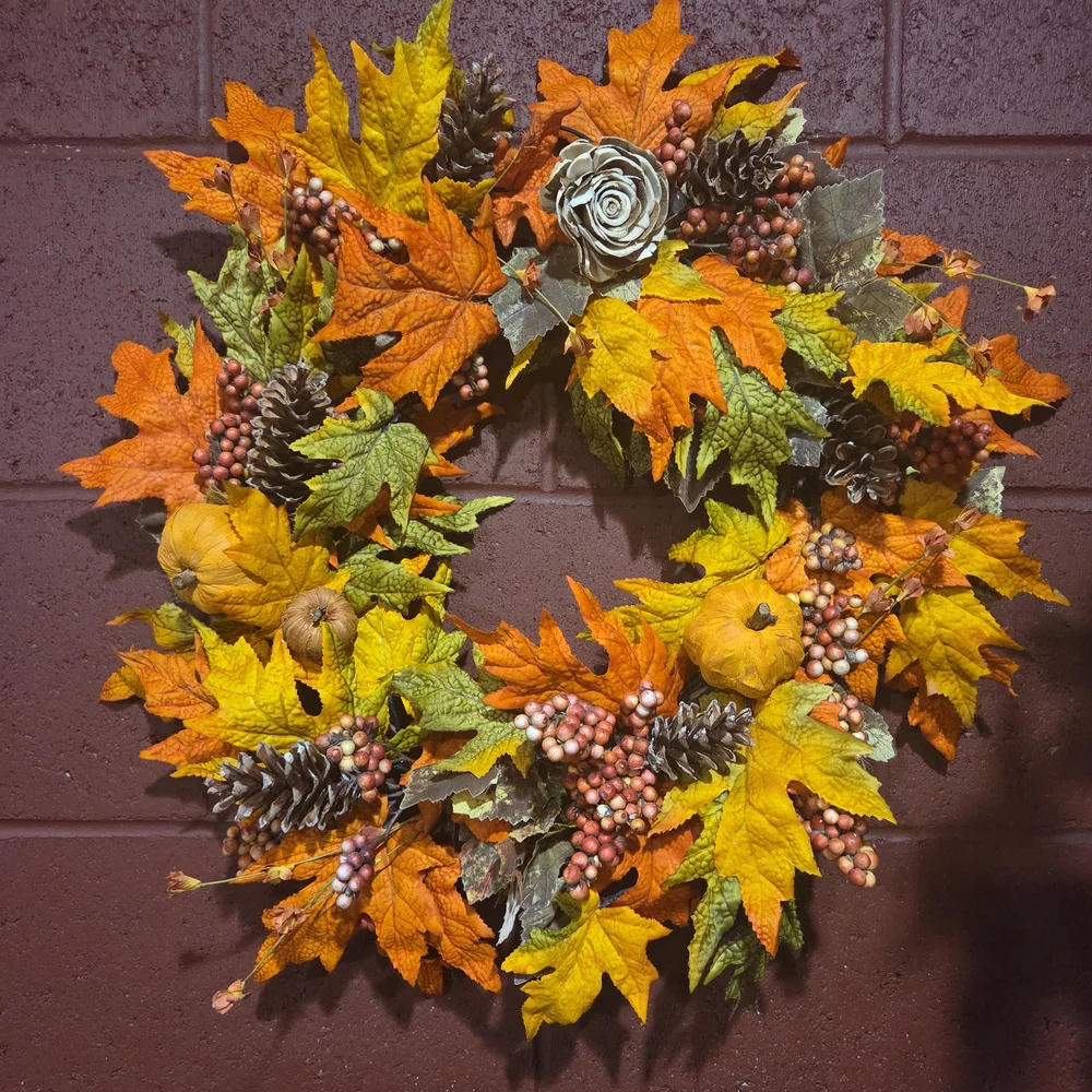 Festive Autumn Wreath with Pinecones, Pumpkins, and Berry