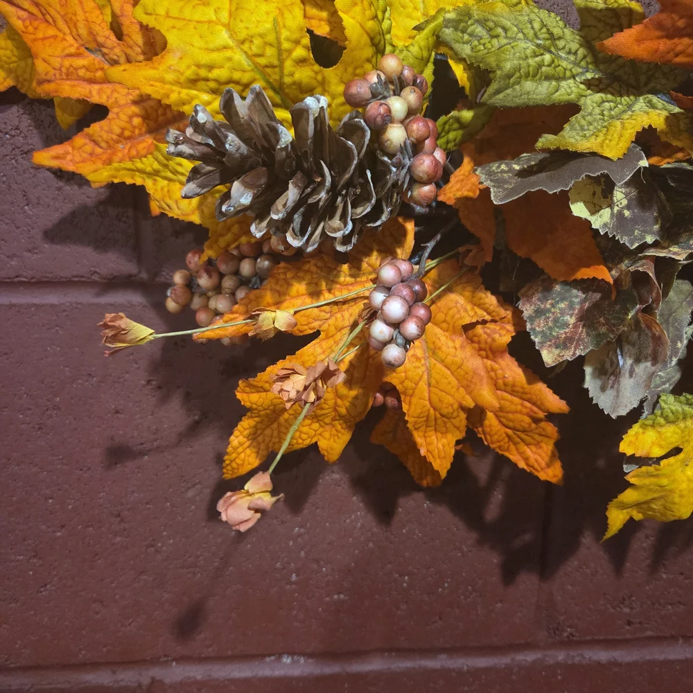 Festive Autumn Wreath with Pinecones, Pumpkins, and Berry
