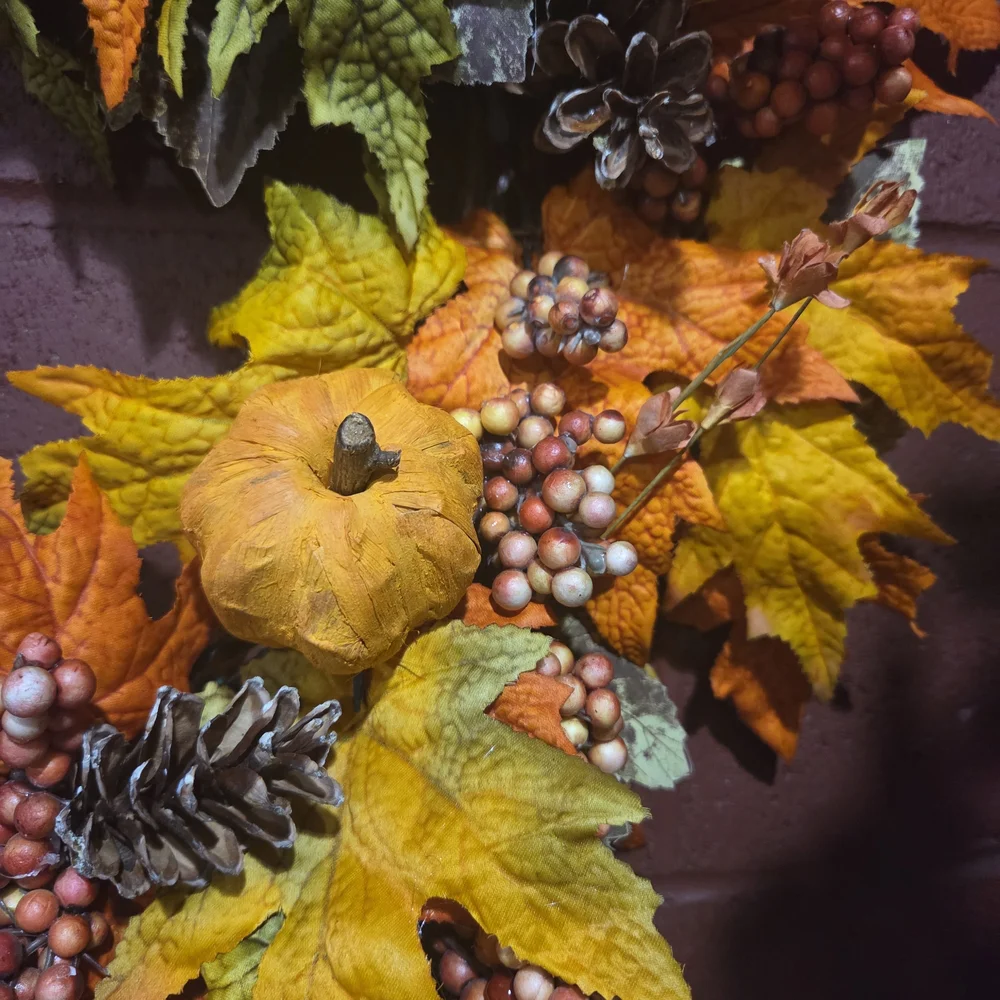 Festive Autumn Wreath with Pinecones, Pumpkins, and Berry