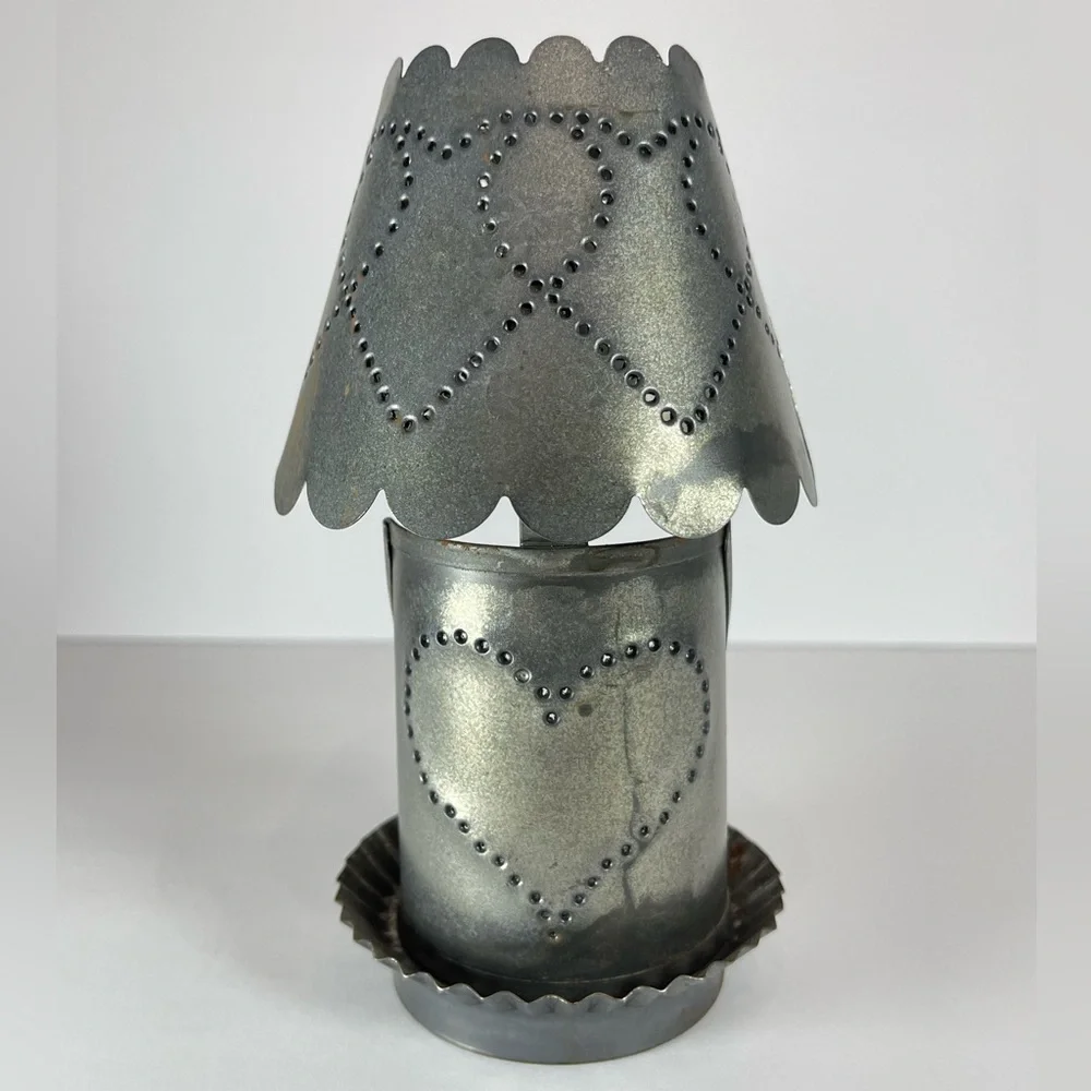 Vintage punched tin tea light candle holder