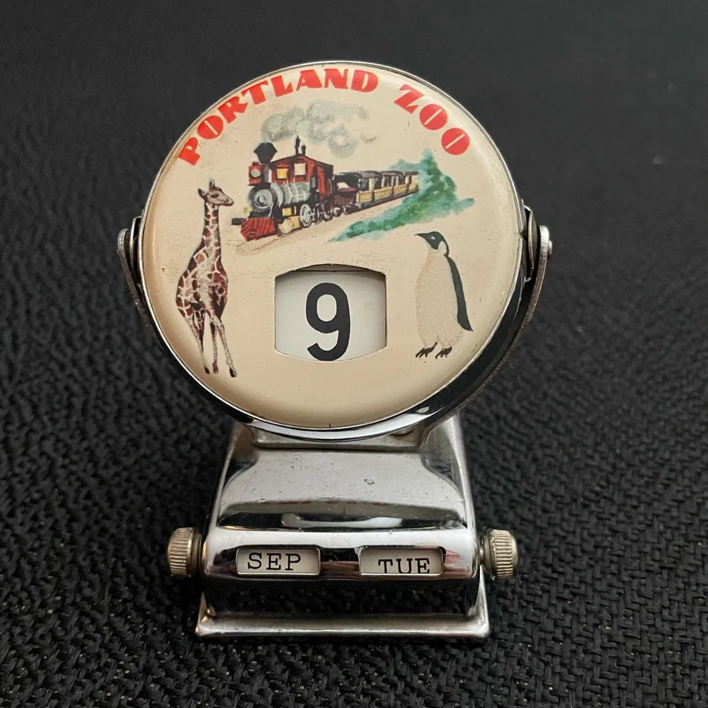 VTG metal perpetual flip calendar featuring Portland Zoo graphic