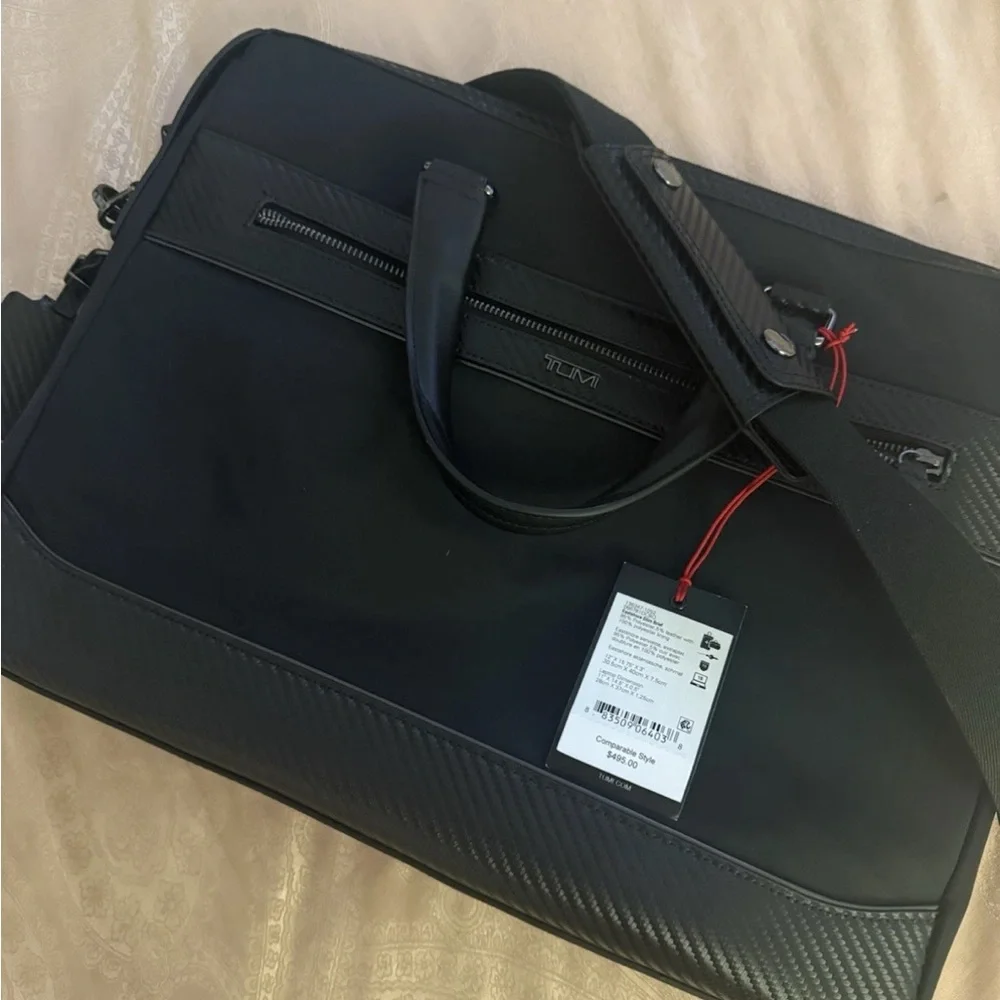 Tumi sleek black