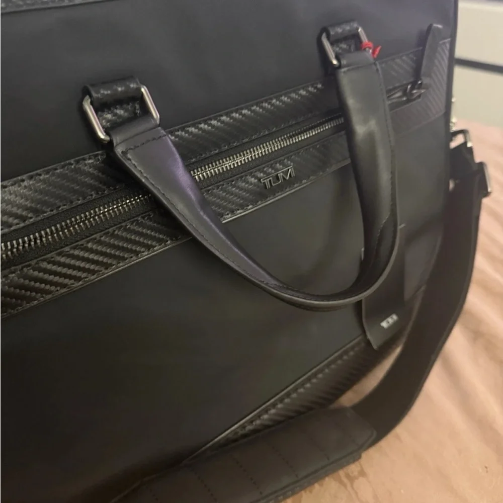 Tumi sleek black