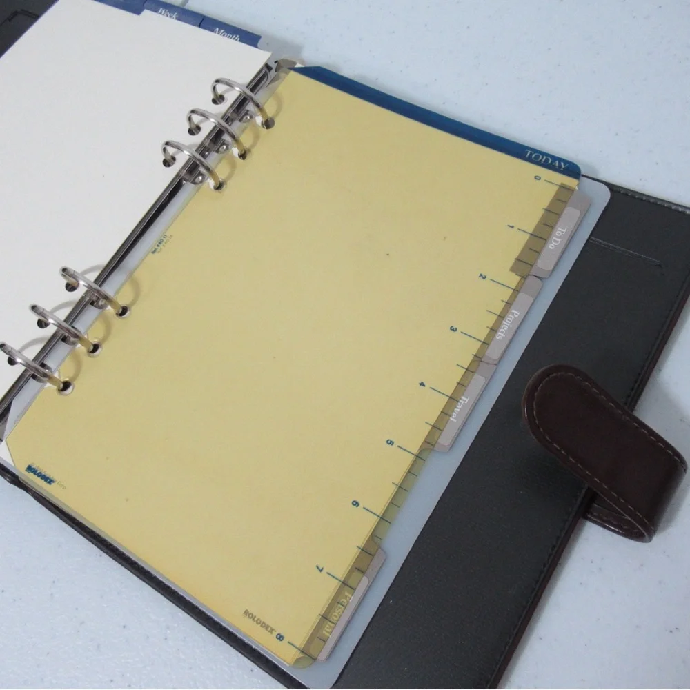 Rolodex back gently