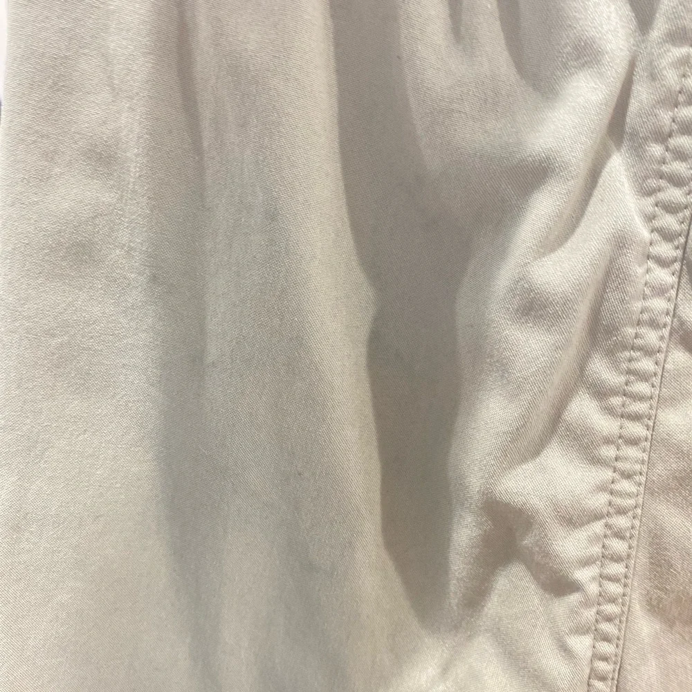 The North Face women’s Light Tan Cargo Pants hiking nylon zipper back pocket