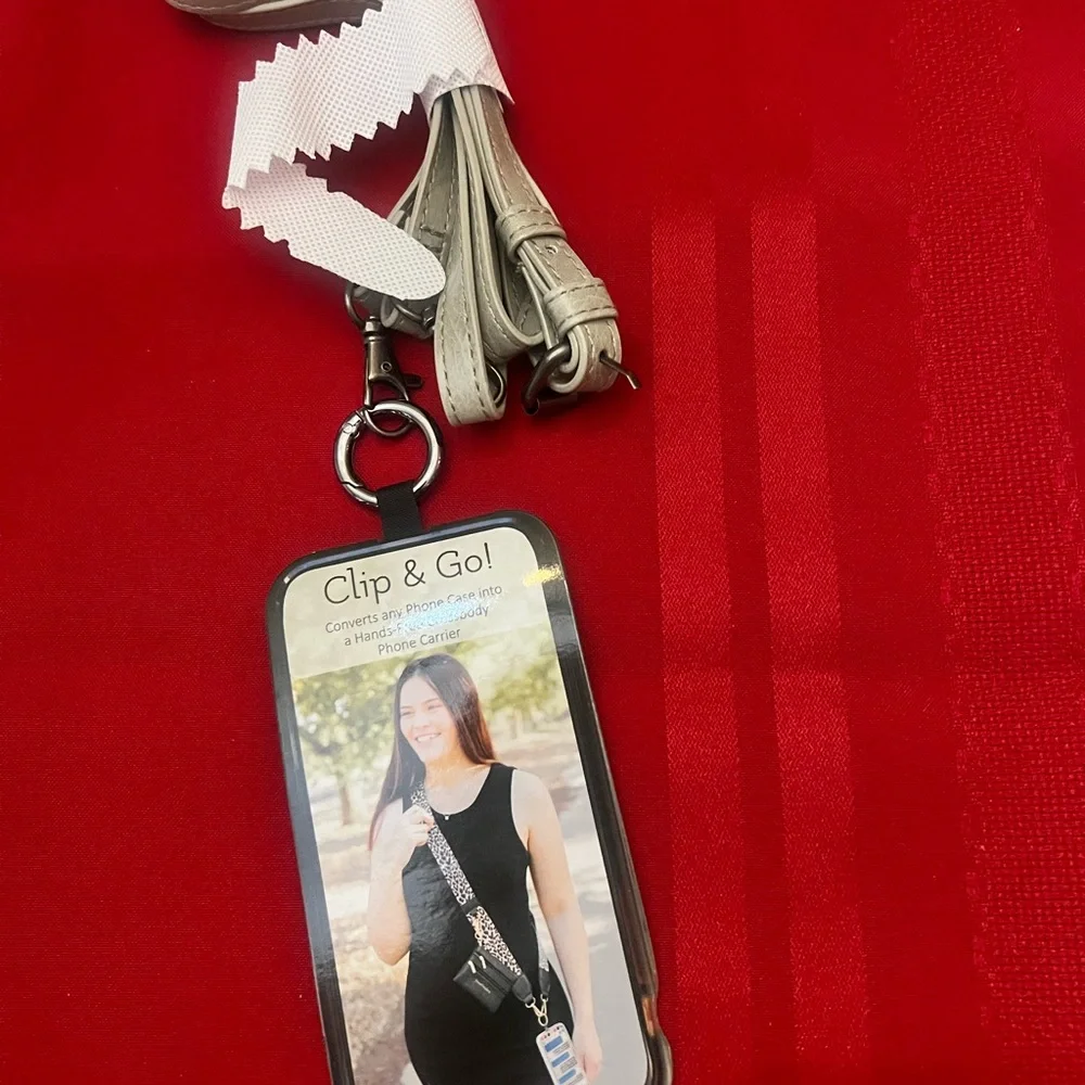 Teacher gift STG strap converts phone case into hands free holds lanyard