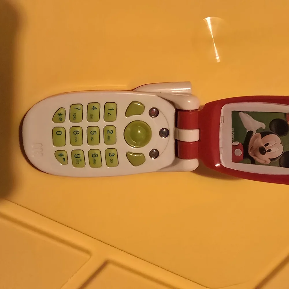 Red and White Toy Flip Phone