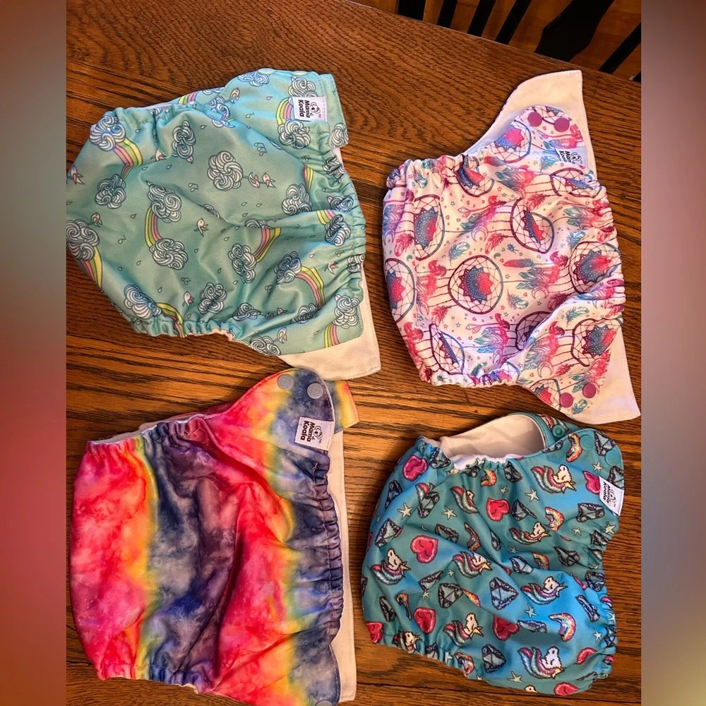 Colorful Kids Cloth Diaper Cover Set/4. (Value of 31 on website)Like new. Easy !