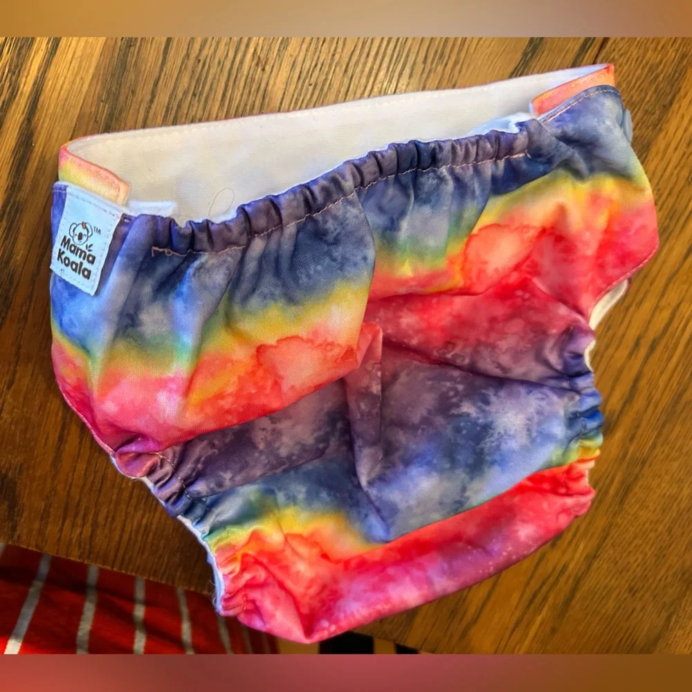 Colorful Kids Cloth Diaper Cover Set/4. (Value of 31 on website)Like new. Easy !