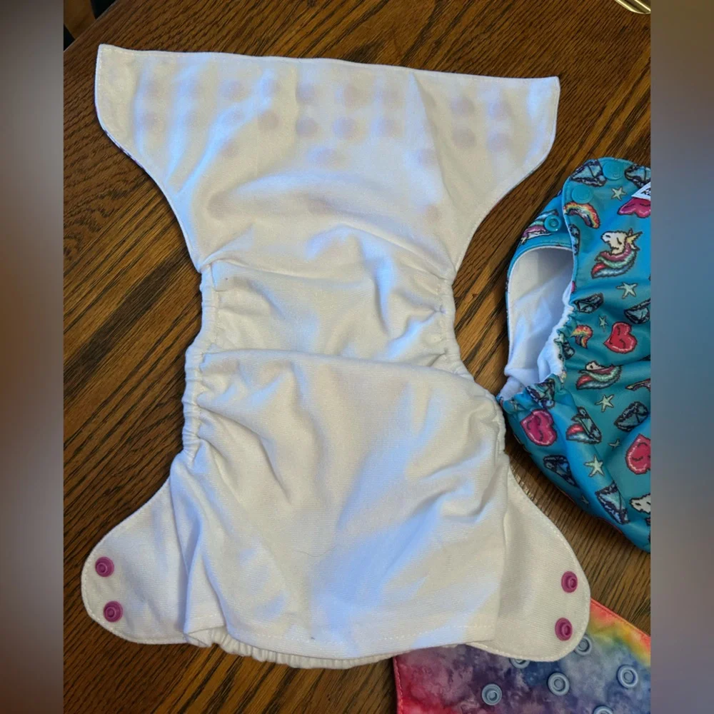 Colorful Kids Cloth Diaper Cover Set/4. (Value of 31 on website)Like new. Easy !