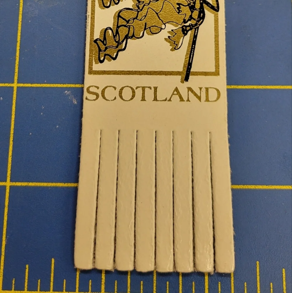 Felts Fun Finds white leather bookmark
