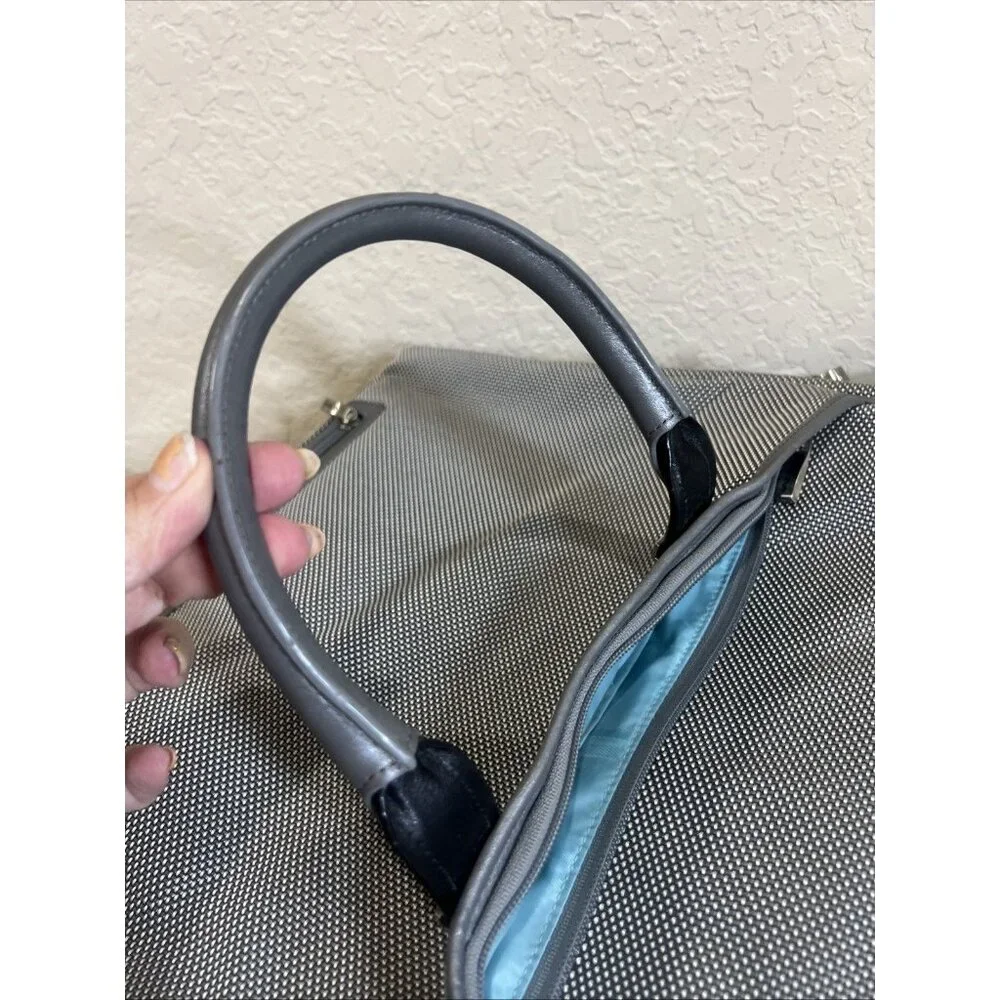 Tumi gray laptop