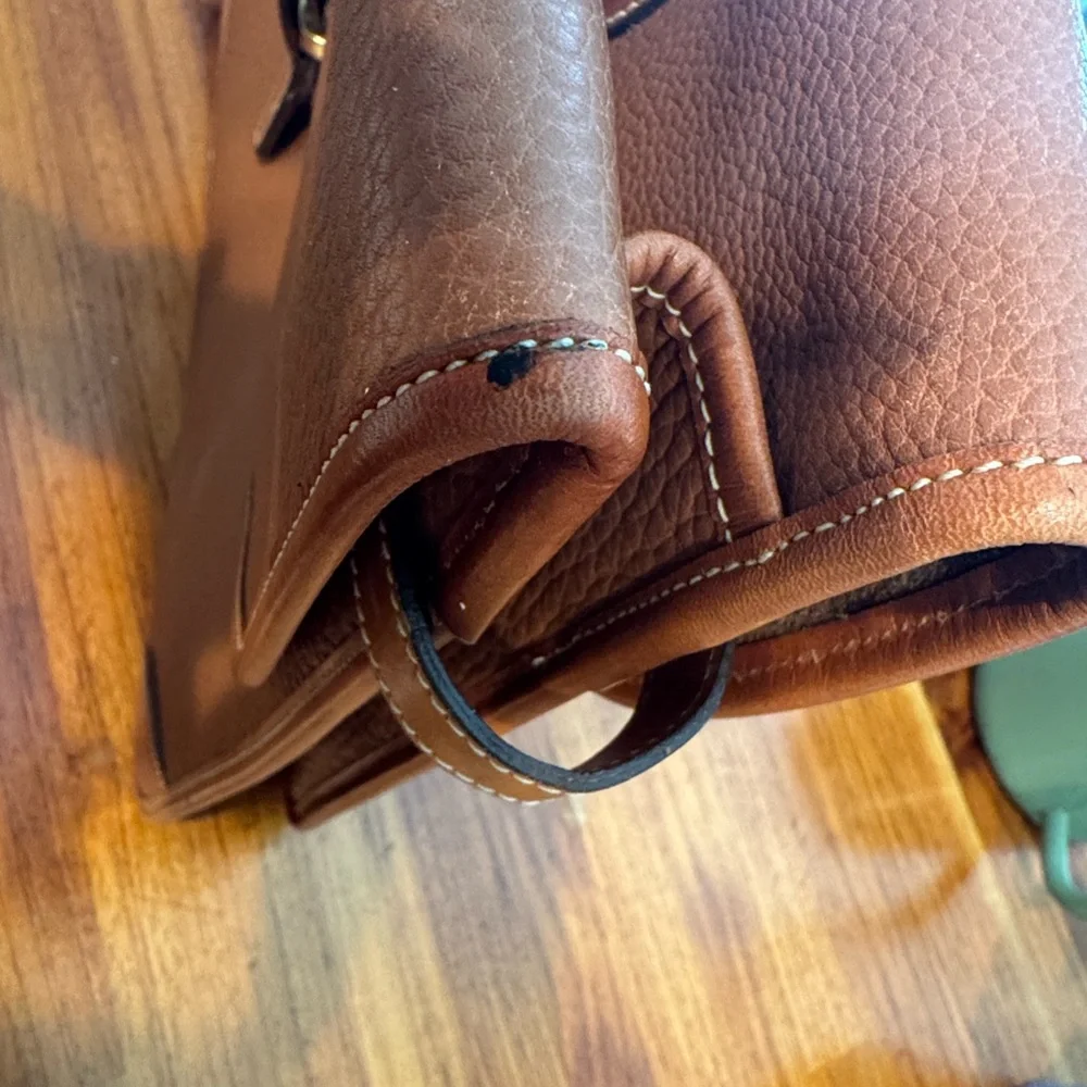 Vintage camel colored Dooney and Bourke all weather leather briefcase/laptop bag