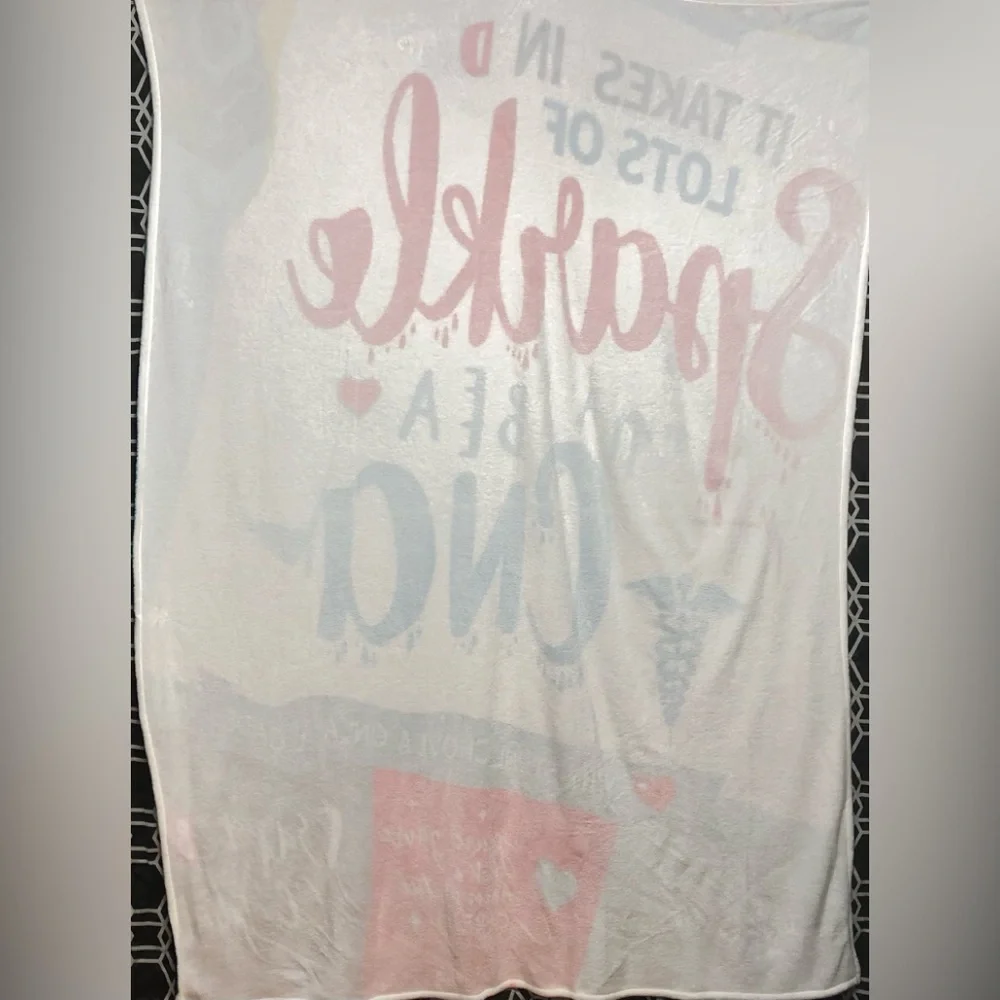 Cozy warm Blanket It Takes Lots Of Sparkle To Be a CNA graphic. 80”LX60”W