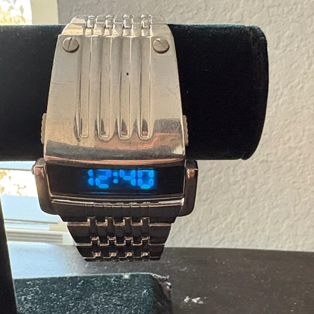 Elegant Silver Smartwatch with Blue Display