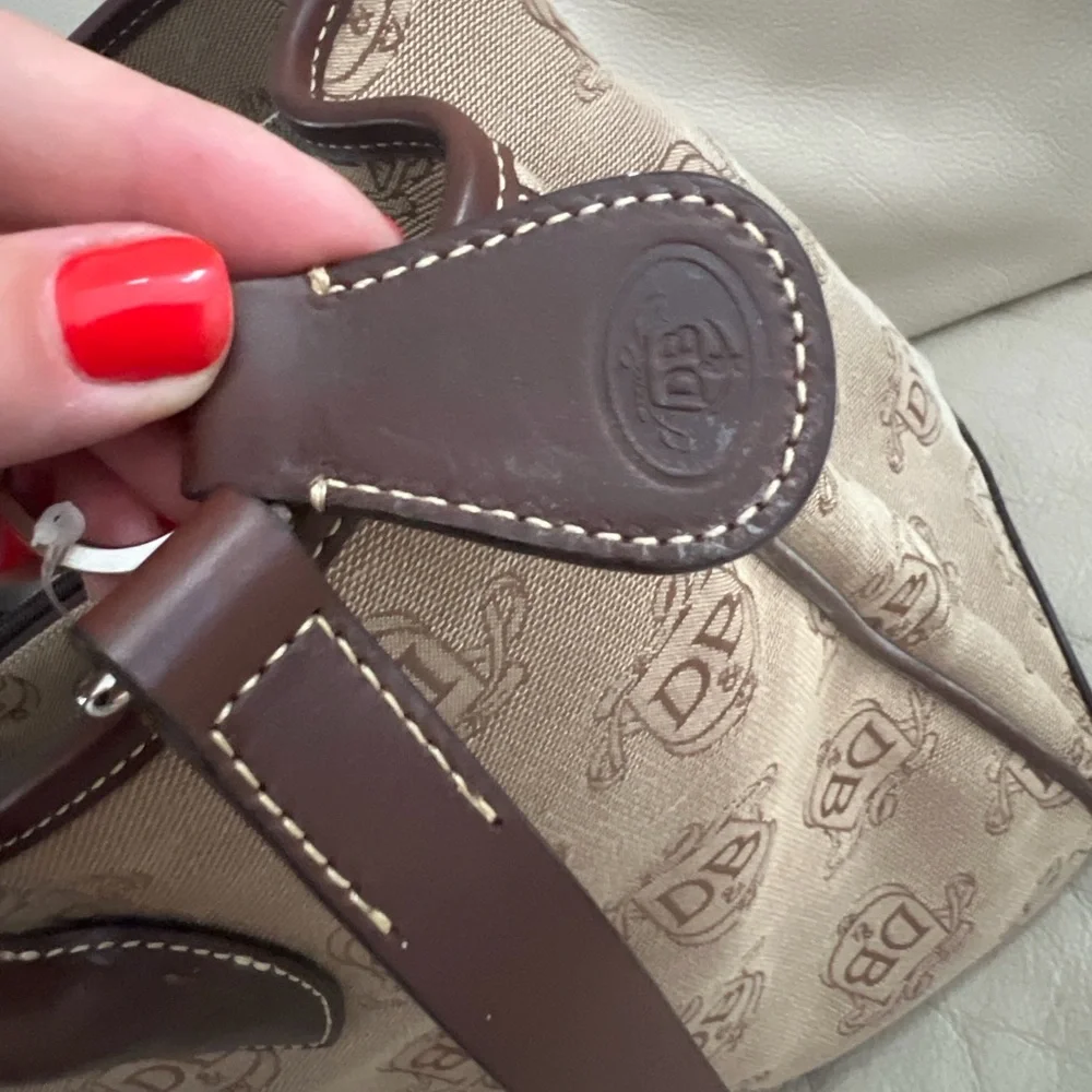 Dooney & Bourke stylish men