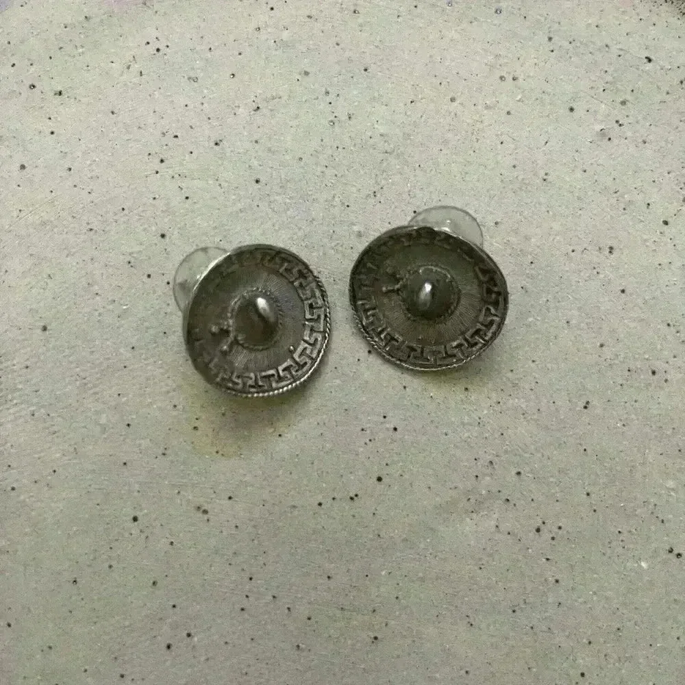 Stealing silver antique sombrero earrings