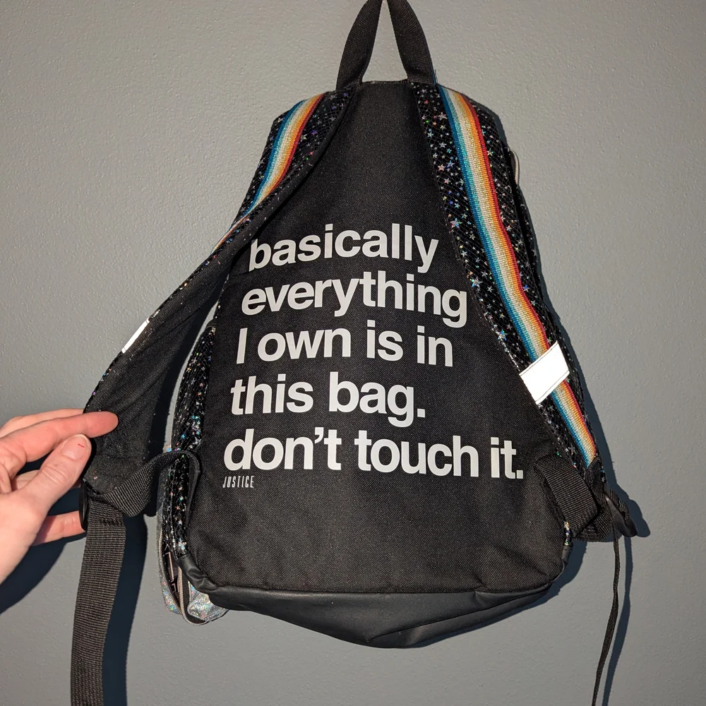 Justice Black Glitter Star Backpack with Rainbow Stripe