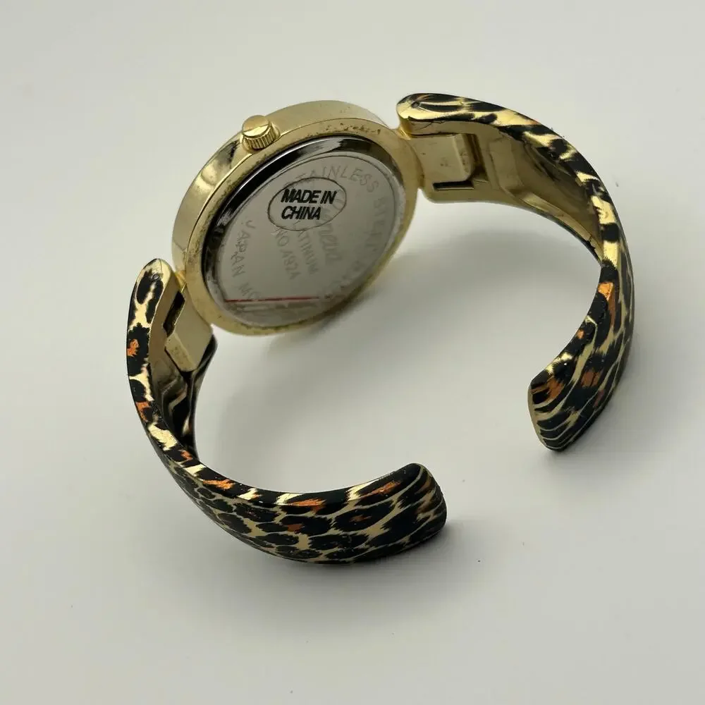 Geneva Platinum Women's Leopard Print Bangle Cuff Fashion Watch New Battery