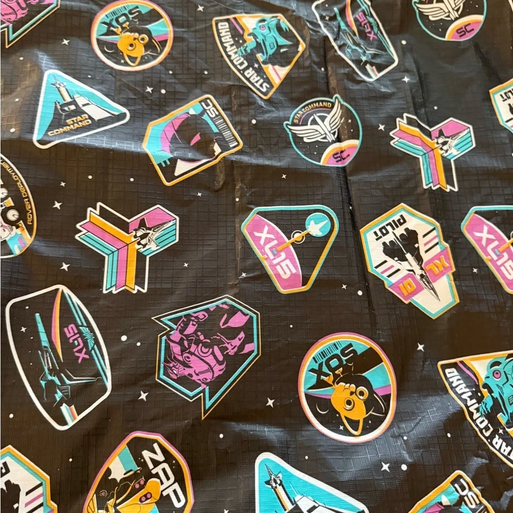 Disney Pixar Lightyear Tablecloth Black with Teal, Pink & Yellow Accents EUC