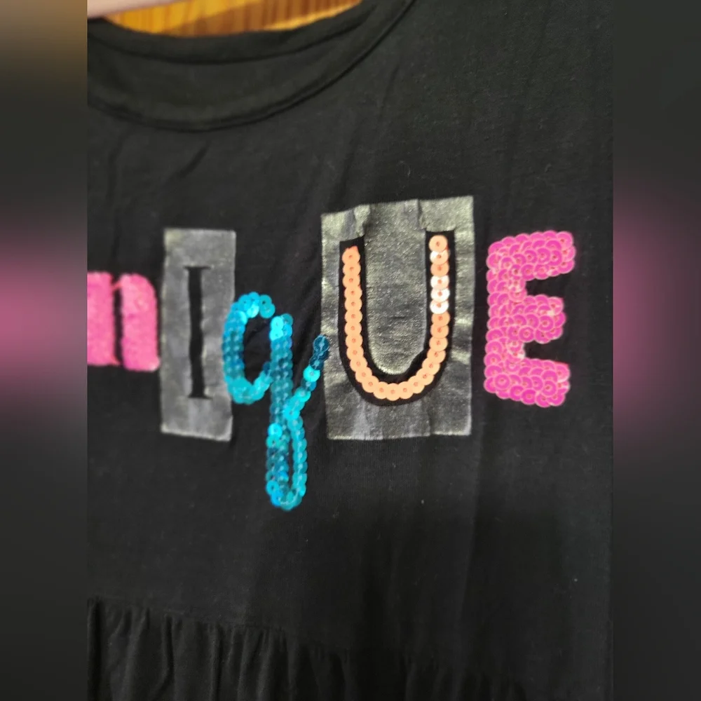 Justice Girls Black 'Unique' Short Sleeve Tunic Top with Colorful Sequin Letters