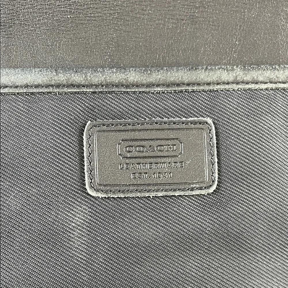 Coach sleek black