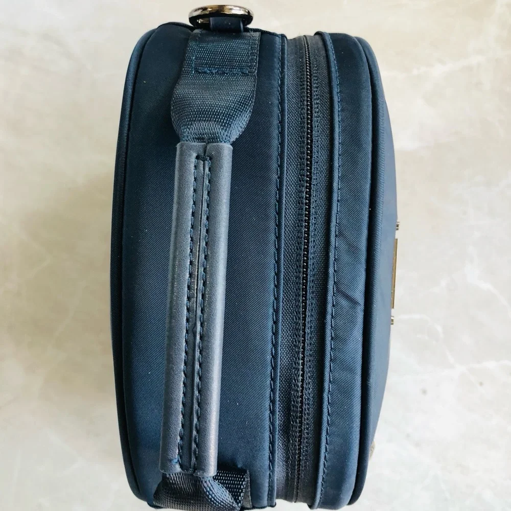 Tumi compact crossbody