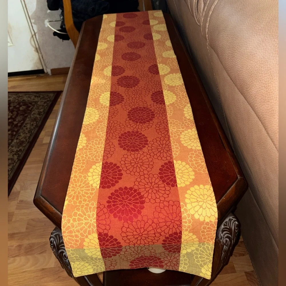 Orange and yellow table runner floral pattern
