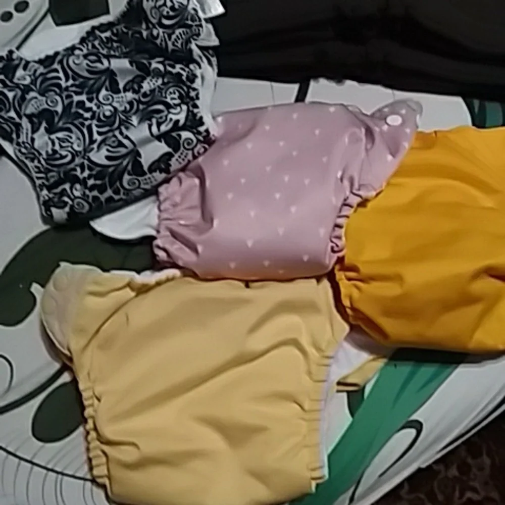 BumGenius Cloth Diaper Covers in Pink, Yellow, Mustard