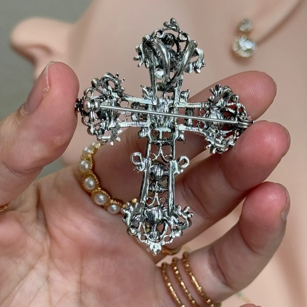 Anthropologie elegant cross