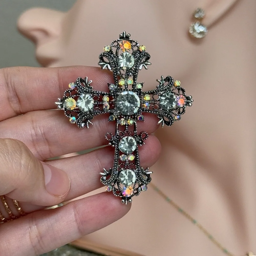 Anthropologie elegant cross
