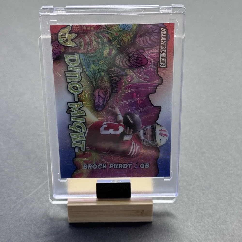 Brock Purdy Dino-Might Illumination‎ Wild Card Football QB Insert Parallel