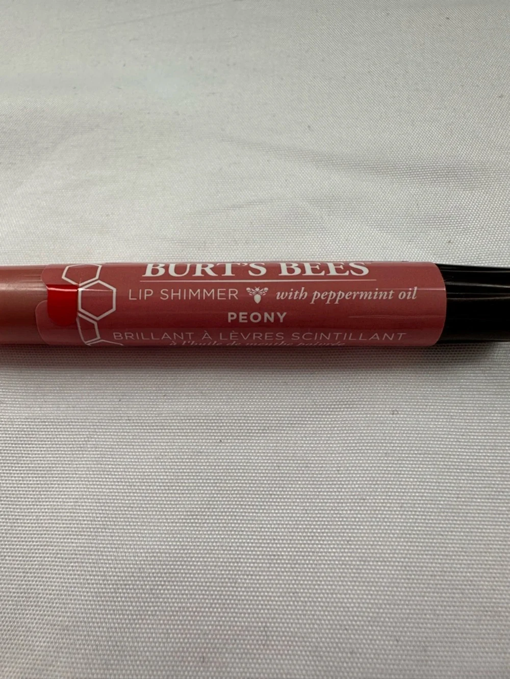 Burts Bees are shimmer slightly