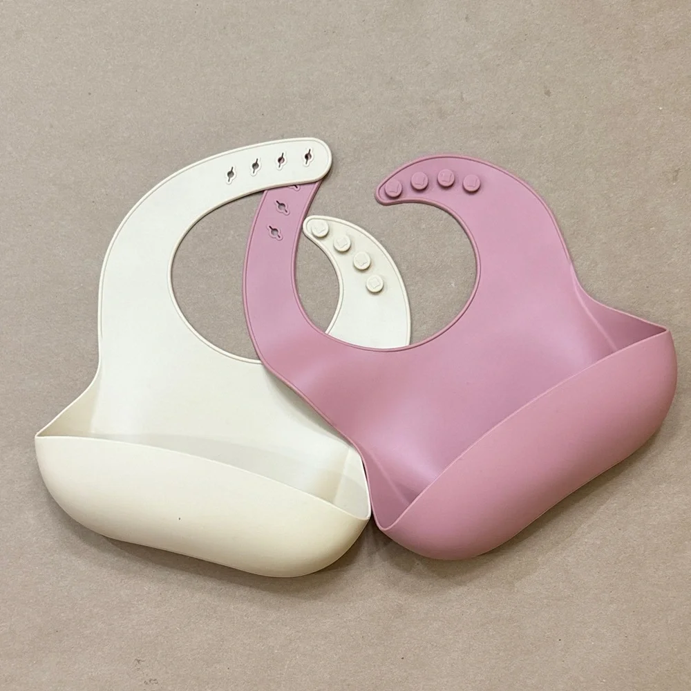 Cream and Pink Silicone Baby Bibs