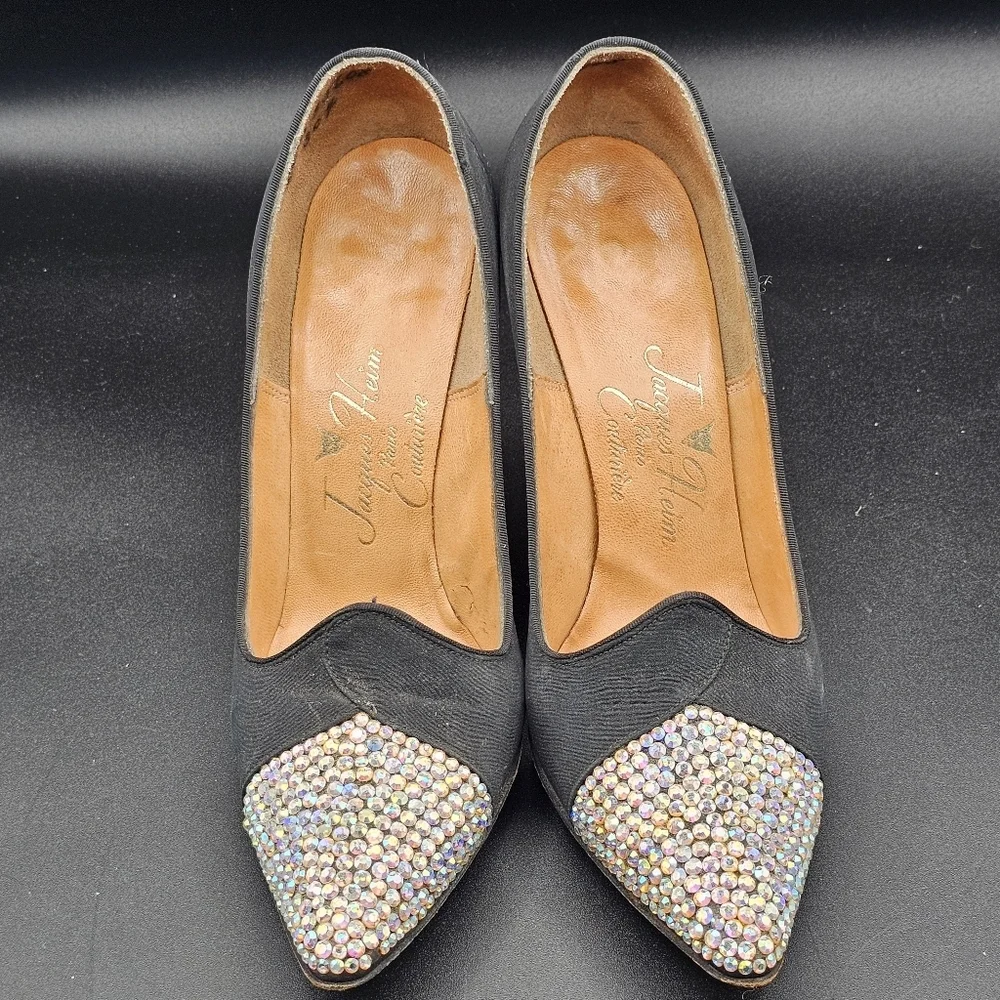 Jacques Heim pumps with a rhinestone-embellished toe.