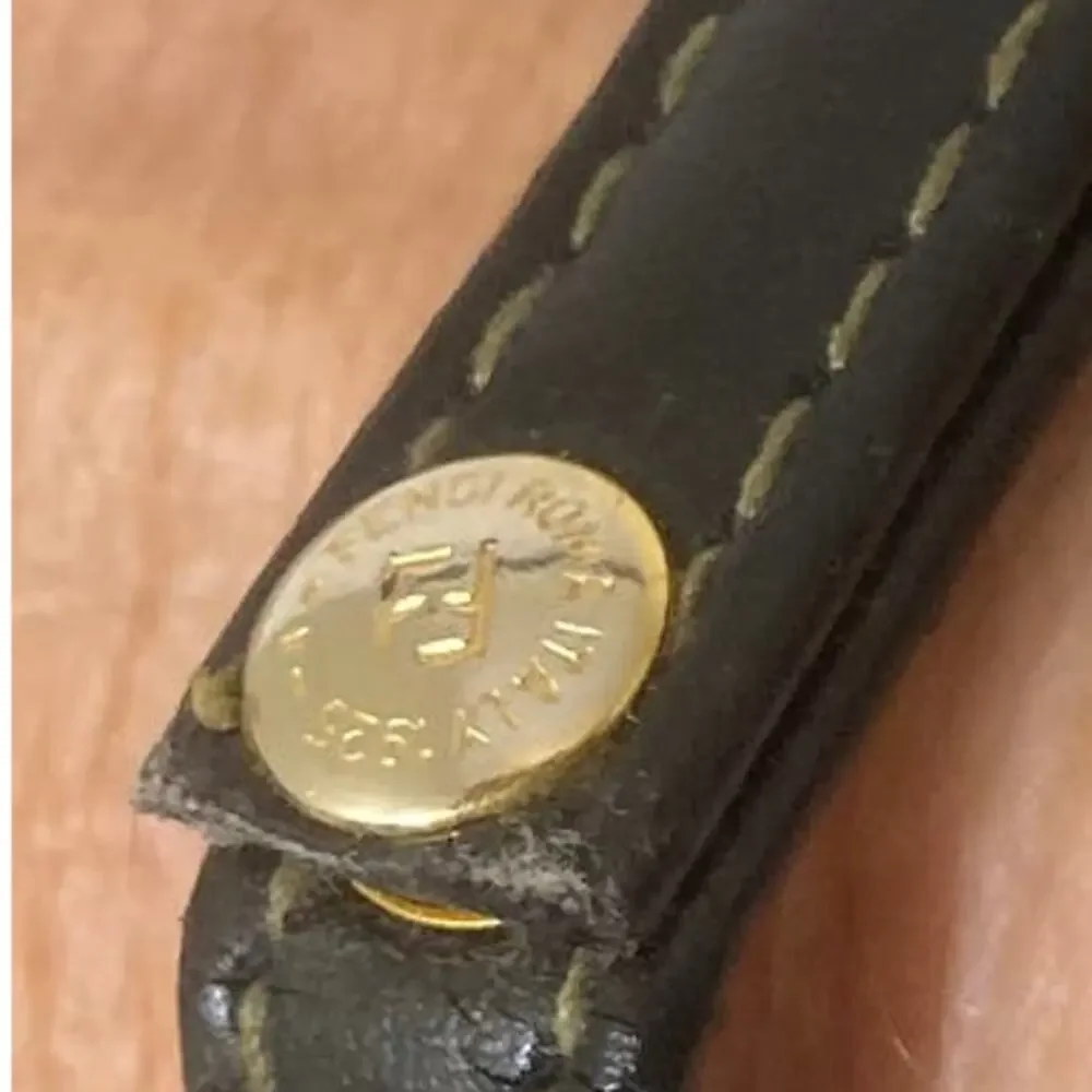 Upcycled leather logo bracelet, gold tone Fendi logo hardware purse strap