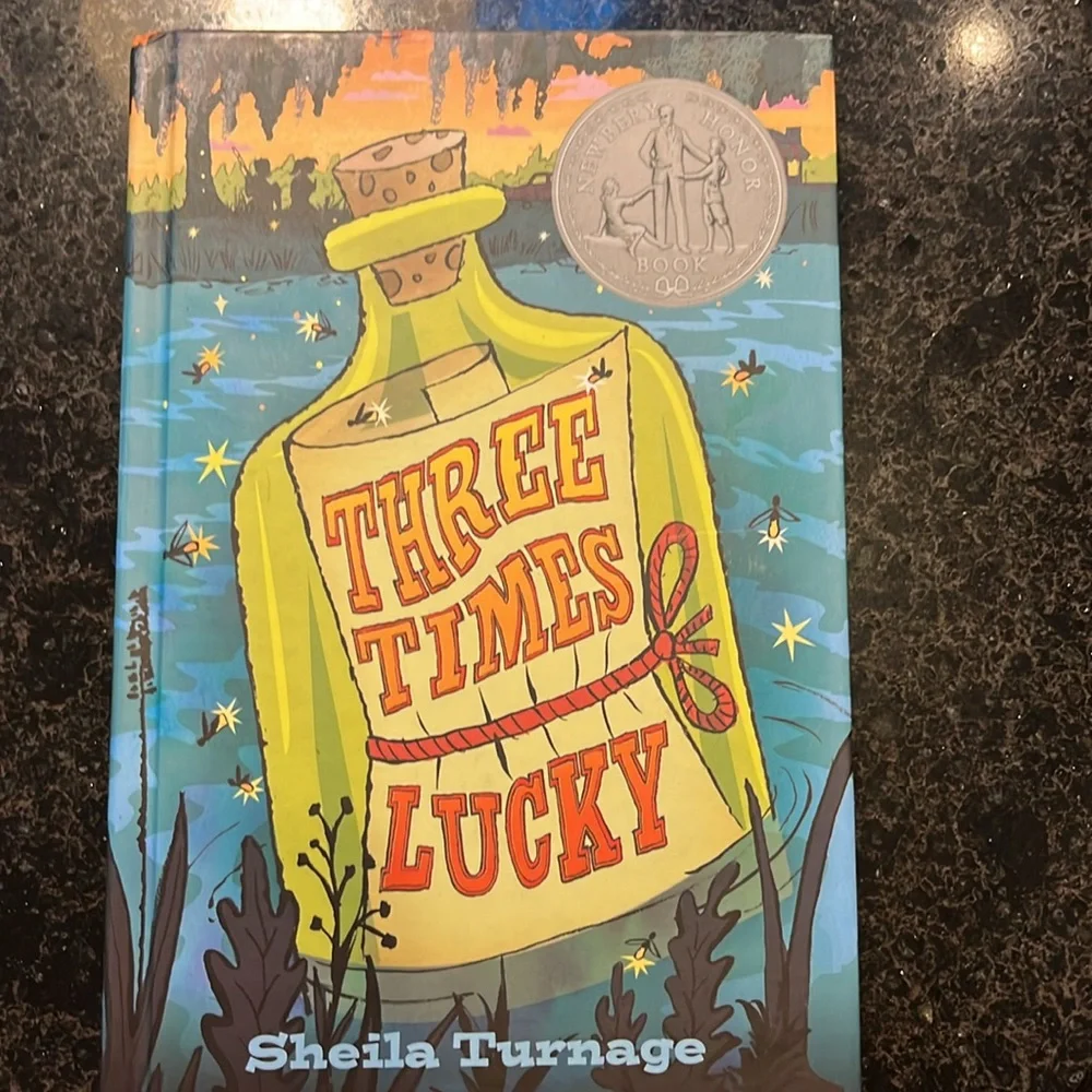 Set of 3, hardcover books by Sheila Turnage,