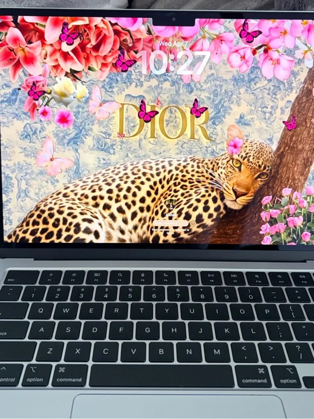 Dior Leopard Lock Screen with Gold Logo and Pink Floral Accents